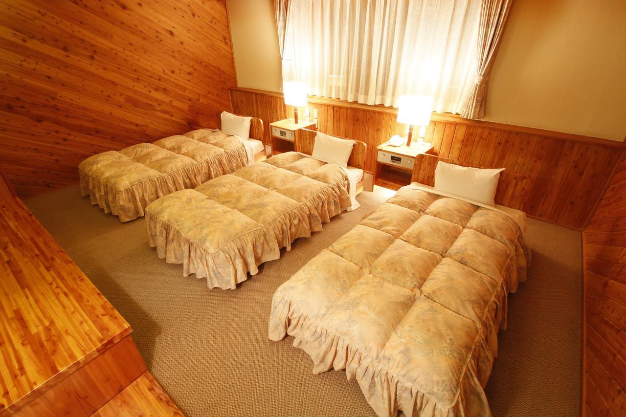 Log Hotel Larch Lake Kanayama Minamifurano Zimmer foto