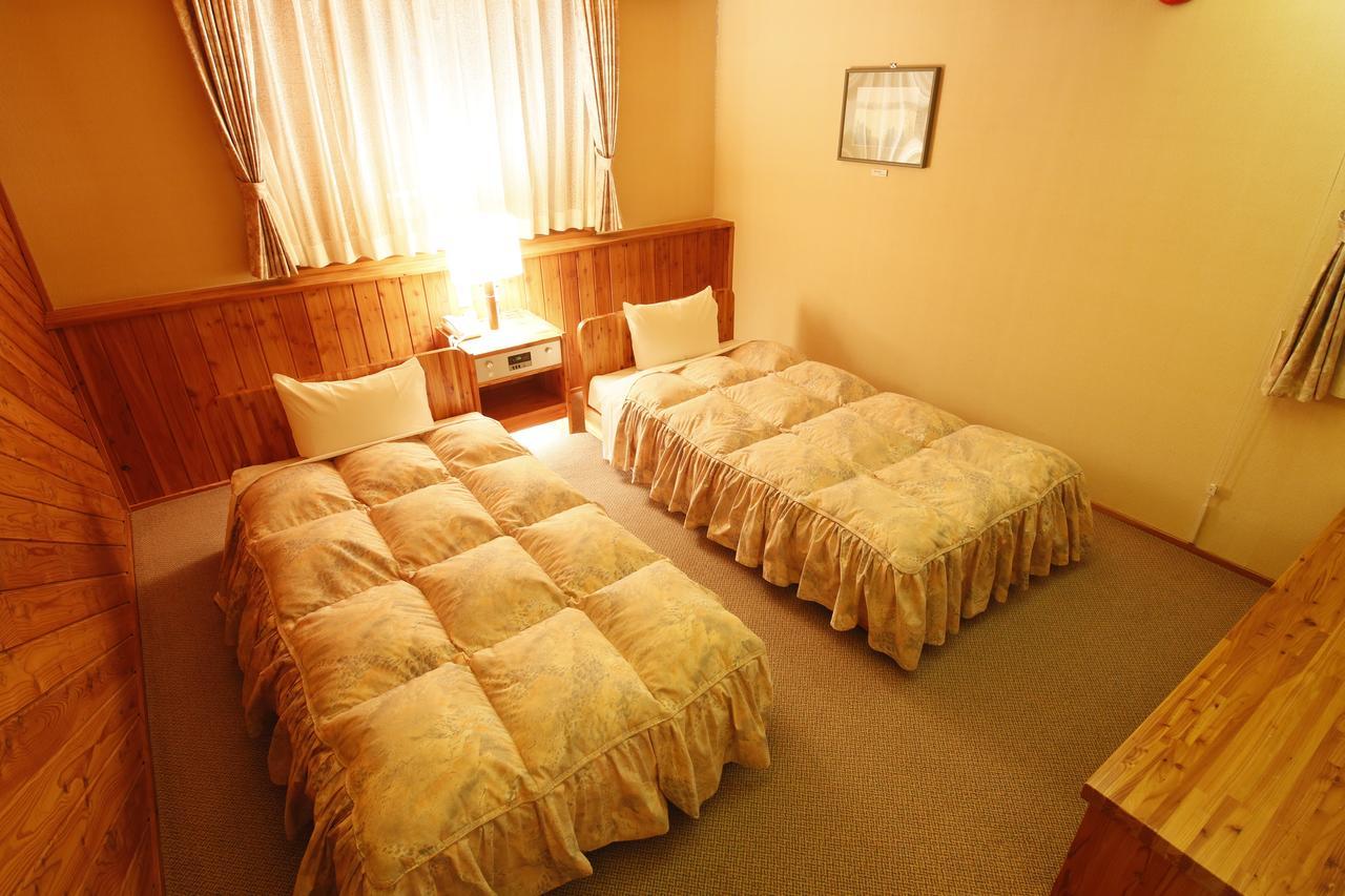 Log Hotel Larch Lake Kanayama Minamifurano Zimmer foto