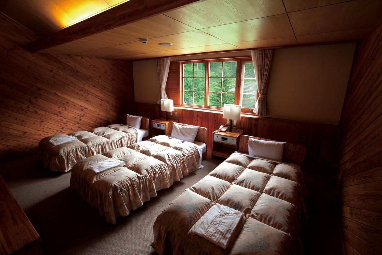 Log Hotel Larch Lake Kanayama Minamifurano Zimmer foto