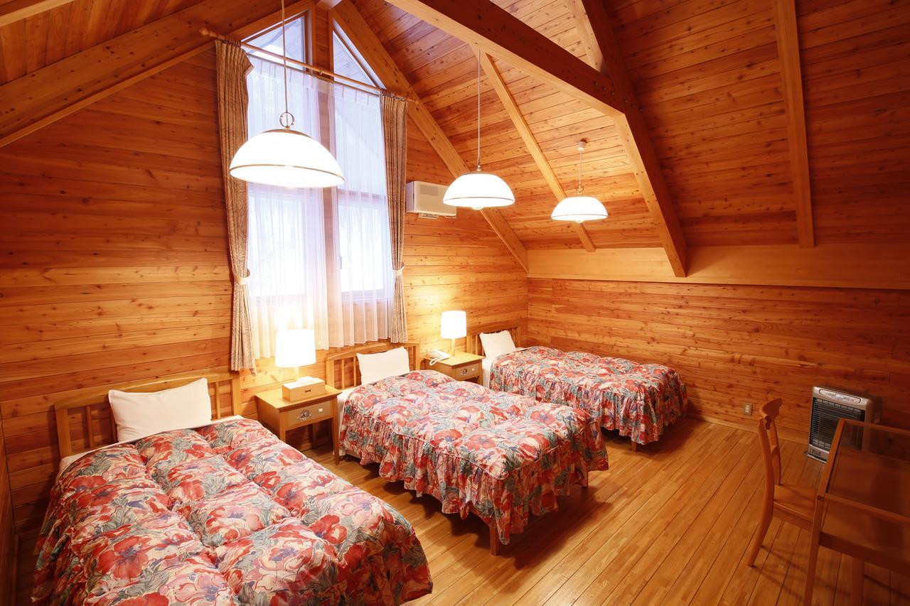 Log Hotel Larch Lake Kanayama Minamifurano Zimmer foto